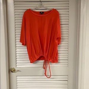 T-shirt with tie bottom